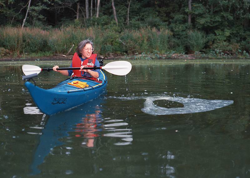 Sept. 9 - 1995 - Lake Attitash, Merrimac/Amesbury, Massachusetts.<br />Joyce attempting to deploy a sculptural object.