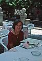 July 6, 1995 - El Escorial, Spain.<br />Joyce sitting at an outdoor table of a restaurant in the village.