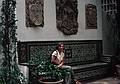 July 7, 1995 - Madrid, Spain.<br />Joyce sitting on a tile bench below coats of arm at the Sorolla Museum yard.