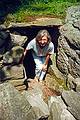 July 13, 1996 - America's Stonehenge, Salem, New Hampshire.<br />Joyce emerging from an underground chamber.