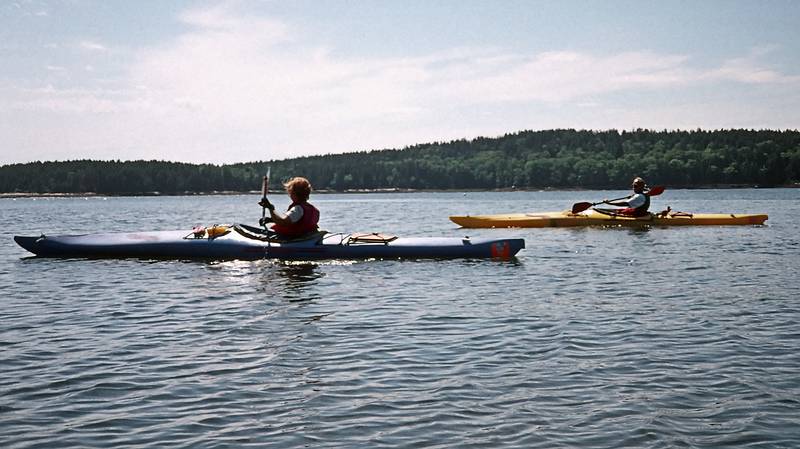 July 29, 1996 - Kayaking off Bethel Point, Brunswick, Maine.<br />Baiba and Ronnie in Ridley Cove with Yarmouth Island in back.