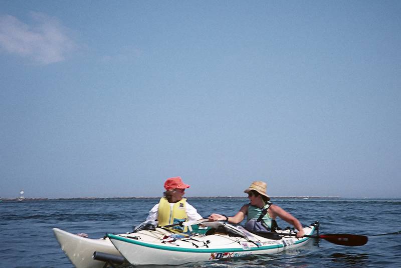 August 22, 1996 - Newburyport, Massachusetts.<br />Nancy meeting Leigh Morehouse, who kayaked up from Florida.<br /> (Photo by Joyce).