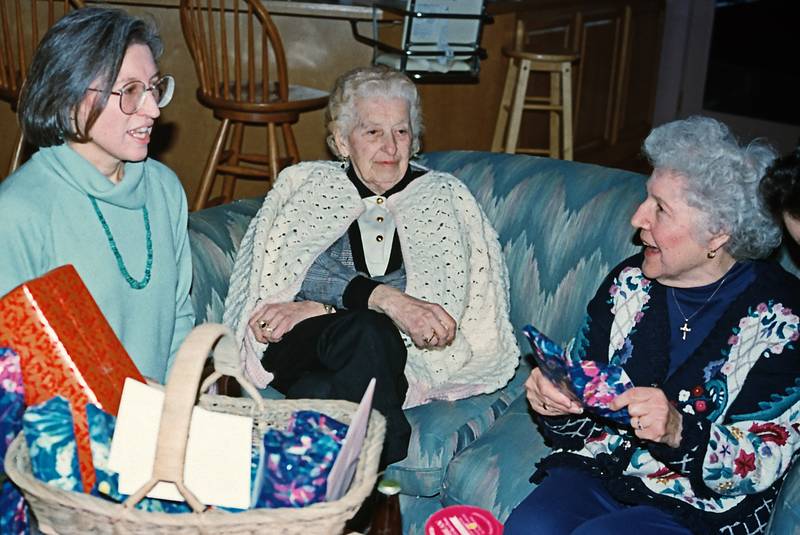 Jan. 18, 1997 - At Tom and Kim's for Marie's 75th birthday, South Hampton, New Hampshire.<br />Joyce, Joanne, and Marie, who is opening on of her 75 presents,<br />one for each year.