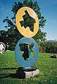 Oct. 12, 1997 - Storm King Arts Center, Mountainville, New York.<br />Joyce behind sculpture.