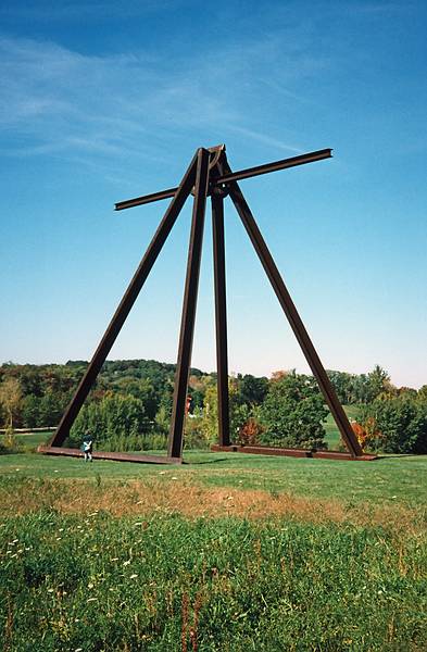 Oct. 12, 1997 - Storm King Arts Center, Mountainville, New York.<br />Joyce at the base of Mark di Suvero's 'Pyramidian', 56 feet tall.