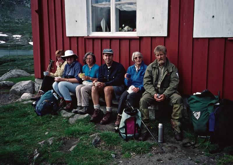 August 3, 1997 - Haugastl to Finse hike, Norway.<br />First break at a farm building: Glynis, Lynne, Joyce, Michael, Lynn, and Torger.