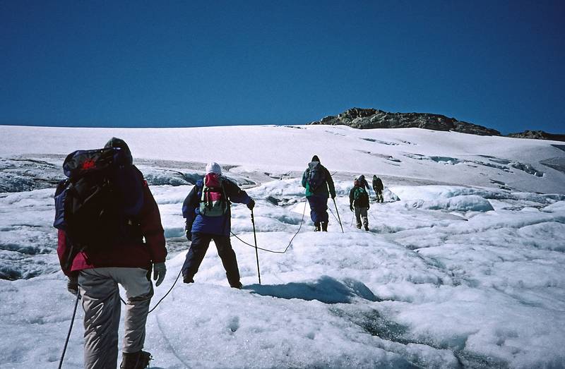 August 5, 1997 - From Finse to the Hardangerjøkulen (glacier) and back, Norway.<br />Roped together on the glacier.