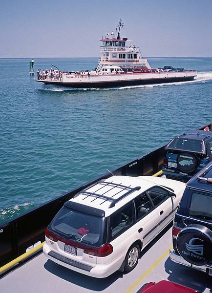 Joyce's car on deck of our ferry while another ferry motors in the other direction.<br />May 29, 1998 - On the Ocracoke to Cape Hatteras ferry.