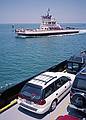 Joyce's car on deck of our ferry while another ferry motors in the other direction.<br />May 29, 1998 - On the Ocracoke to Cape Hatteras ferry.