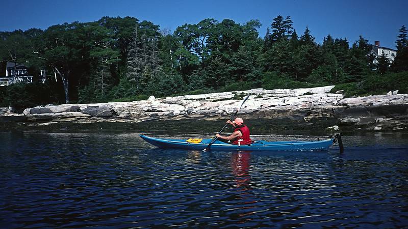 Joyce paddling Burnt Island.<br />Auguts 2, 1998 - Out of Lineking Bay, Boothbay Harbor, Maine.