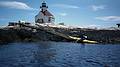 Egils trying to paddle up the ramp to Cuckolds Lighthouse.<br />(Actually, I'm backing out after our lunch stop here.)<br />Auguts 2, 1998 - Out of Lineking Bay, Boothbay Harbor, Maine.