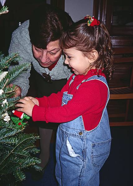 Ana and her granddaughter Elizabeth.<br />Christmas tree decorating party.<br />Dec. 22, 1998 - Merrimac, Massachusetts.