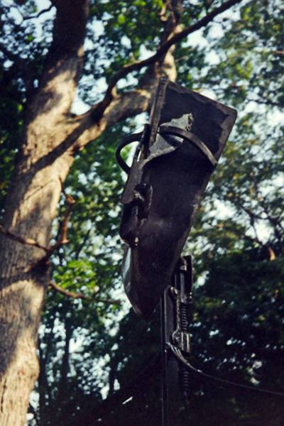 Face of Introspection, sculpture by Joyce, on rear deck of house.<br />August 28, 1999 - Merrimac, Massachusetts.