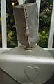 Aluminum bust with heart (sculpture by Joyce).<br />August 28, 1999 - Merrimac, Massachusetts.