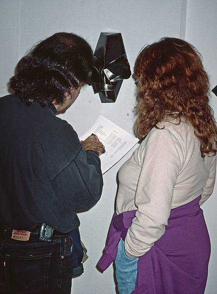 A couple looking at Joyce's iron mask.<br />Sept. 17, 1999 - Pentucket Arts Center, Haverhill, Massachusetts.