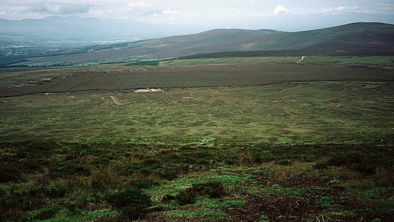 Looking back at the valley from where we came.<br />Hike to peat bog and on to ridge.<br />Sept. 4, 1999 (Day 7) - Nire Valley, County Waterford, Ireland.