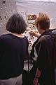 Joyce and Baiba admiring some amber jewelry at a sidewalk stand.<br />May 13, 2000 - New York, New York.