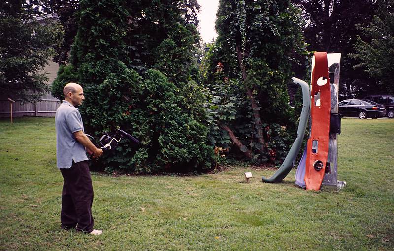 Mitchell Rosenzweig and his "Together" ($7500).<br />Artists' talk at the Moses Kent House Outdoor Sculpture Exhibit.<br />August 13, 2000 - Exeter, New Hampshire.