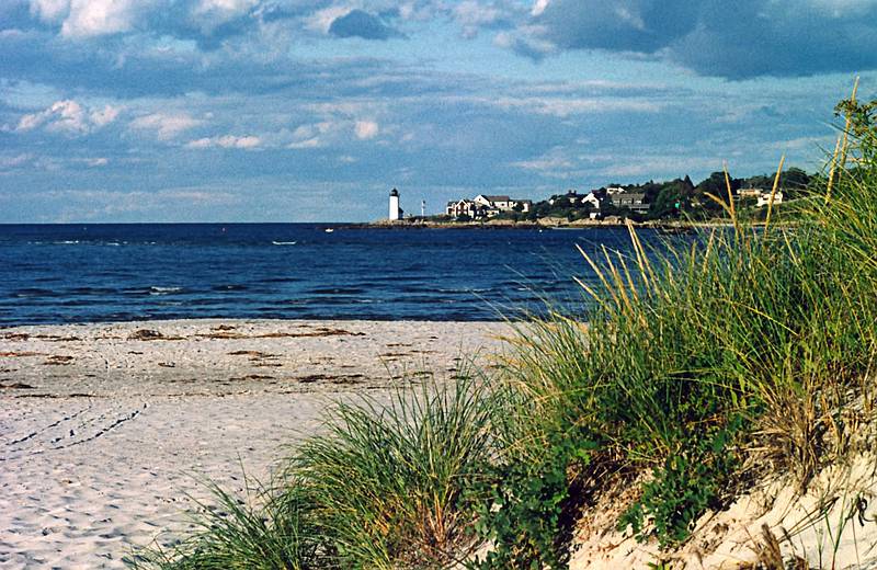 The Annisquam Harbor Lighthouse across the Annisquam River.<br />Oct 8, 2000 - Wingaersheek Beach, Gloucester, Massachusetts.