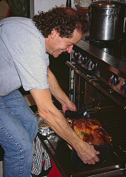 Paul taking the turkey out of the oven.<br />Nov. 23, 2011 - Thanksgiving at Paul and Norma's in Tewksbury, Massachusetts.