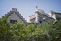 July 6, 2000 - Barcelona, Spain.<br />Tops of 2 buildings, the right one being "Batll" by Gaudi.
