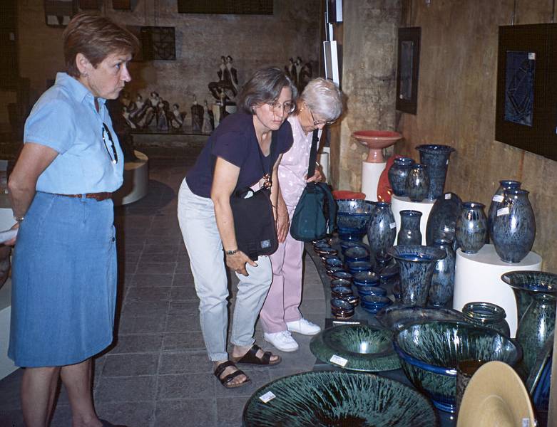 July 11, 2000 - Barcelona, Spain.<br />Baiba, Joyce, and Marie looking over the local craft.
