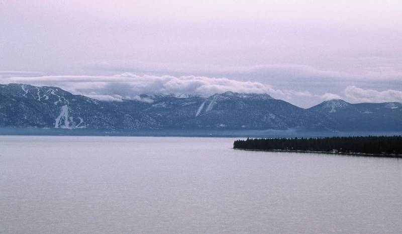 South shore of Lake Tahoe with a couple of ski areas (Heavenly Valley is one of them).<br />Jan. 19, 2001 - Eagle Rock Outlook at Tahoe Pines off CA-89.