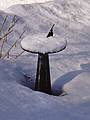 Sundial in back yard, after a snowfall.<br />Feb. 17, 2001 - Merrimac, Massachusetts.