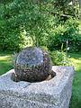 July 7, 2001 - Millbrook Gallery and Sculpture Garden, Concord, New Hampshire.<br />Rotating stone sphere driven by water (and pumped by electricity).