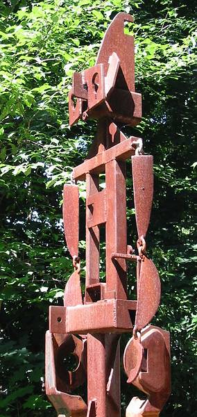 July 31, 2001 - Merrimac, Massachusetts.<br />Joyce's steel sculpture "The Sentinel" standing next to the garage.
