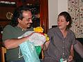 Nov 3, 2001 - Merrimac, Massachusetts.<br />Baby shower for Carl and Holly and birthday celebration for Arianna and Kim.<br />Carl opening a Winnie the Pooh present while Holly looks on.
