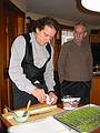 Dec 25, 2001 - Merrimac, Massachusetts.<br />Paul preparing an appetizer while Ronnie looks on.