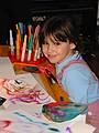 Dec 25, 2001 - At Tom and Kim's in South Hampton, New Hampshire.<br />Arianna and her new mouth operated paint spreyers.