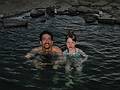 Aug 28, 2001 - Reykjastrnd, Iceland.<br />Eric and Dagbjrt in the geothermal pool Grettislaug (Grettir's bath).