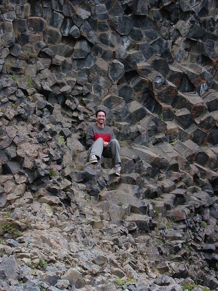 Aug 29, 2001 - Hljaklettar (echoing rocks) in Vesturdalur (west valley) in Jkulsrgljfur National Park.<br />Eric sitting on the end of one of the horizontal columns of basalt.
