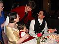 Aug 31, 2001 - Inga and Eric's wedding reception and Atli's 60th birthday celebration, Eskifjrur, Iceland.<br />Everyone came to the table to wish Inga (with Gujn) and Eric well and to deposit a candle.<br />The two women are Dagbjrt's grandmother and great-grandmother on her father's side.