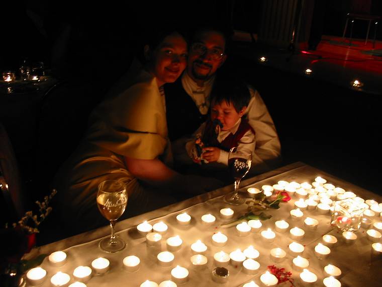 Aug 31, 2001 - Inga and Eric's wedding reception and Atli's 60th birthday celebration, Eskifjrur, Iceland.<br />Inga, Eric, and Gujn and many of the well-wishing candles.