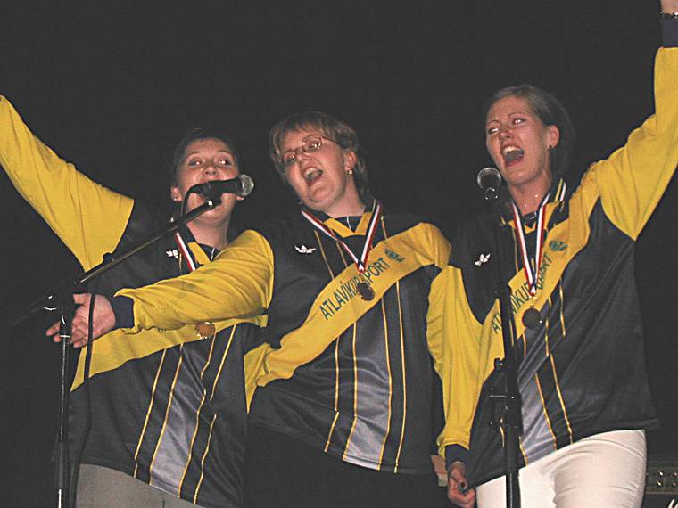 Aug 31, 2001 - Inga and Eric's wedding reception and Atli's 60th birthday celebration, Eskifjrur, Iceland.<br />Kristjana, Dagmar and  Julia singing away in soccer outfits (of Atli's former team)..