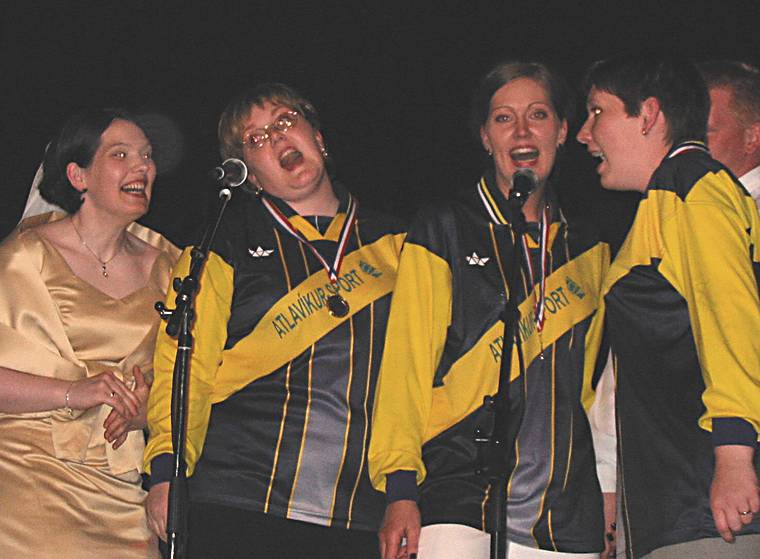 Aug 31, 2001 - Inga and Eric's wedding reception and Atli's 60th birthday celebration, Eskifjrur, Iceland.<br />All four of Atli's daughters singing away.