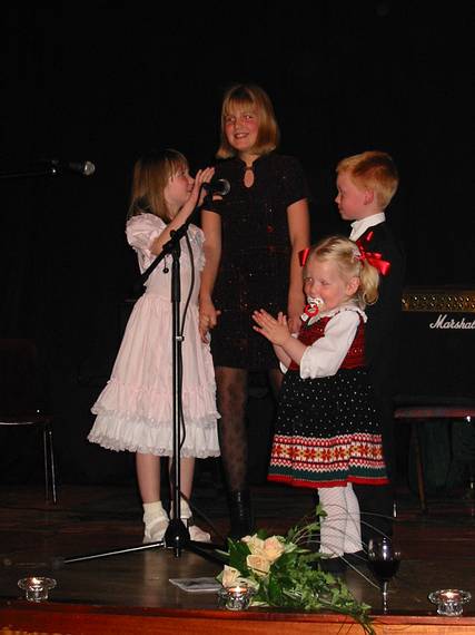Aug 31, 2001 - Inga and Eric's wedding reception and Atli's 60th birthday celebration, Eskifjrur, Iceland.<br />Dagbjrt, Kata, Benna Soley, and Atli Dagur about to sing.