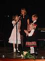 Aug 31, 2001 - Inga and Eric's wedding reception and Atli's 60th birthday celebration, Eskifjrur, Iceland.<br />Dagbjrt, Kata, Benna Soley, and Atli Dagur about to sing.