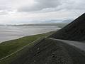 Sept 1, 2001 - Along Rt.1 near road to Hfn.<br />View along the coast towards a tongue of Vatnajkull (Water Glacier) The largest glacier in Europe.