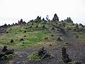 Sept 2, 2001 - Off Rt. 1 (ring road) west of Kirkjubjarklaustur maybe in the Mrdalssandur?<br />Dagbjrt, Melody and Carl atop a rise full of lava rock cairns.