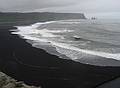 Sept 2, 2001 - Dyrhlaey, Iceland.<br />Black beach and the Reynisdrangur sea stacks.