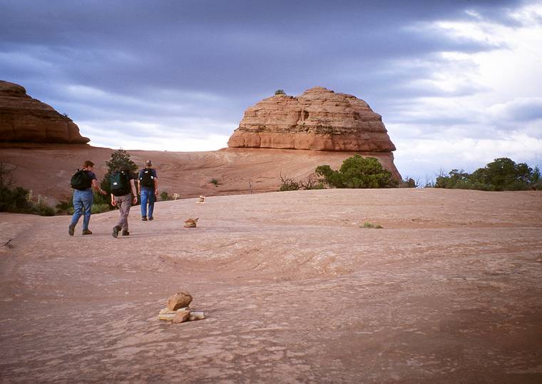 May 13, 2001 - Arches National Park, Utah.<br />Baiba, Joyce, and Ronnie on trail to Delicate Arch.