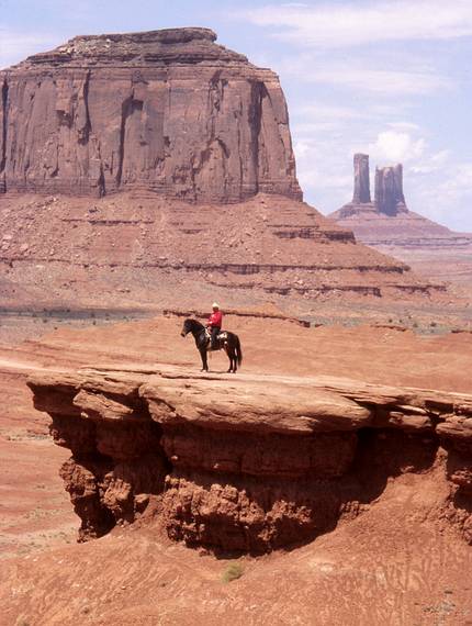 May 17, 2001 - Full day tour of Mystery Valley and Monument Valley, Utah/Arizona.<br />Native on horseback below Merrick Butte.