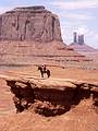 May 17, 2001 - Full day tour of Mystery Valley and Monument Valley, Utah/Arizona.<br />Native on horseback below Merrick Butte.