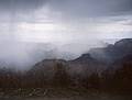 May 19, 2001 - Inperial Point, North Rim of the Grand Canyon, Arizona.<br />View S in a downpour. Mt. Hayden in the foreground.