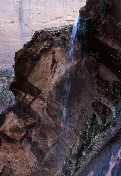 May 20, 2001 - Emerald Pools hike, Zion National Park, Utah.<br />Water dripping down over the wall from Middle Emerald Pool to the Lower Emerald Pool.
