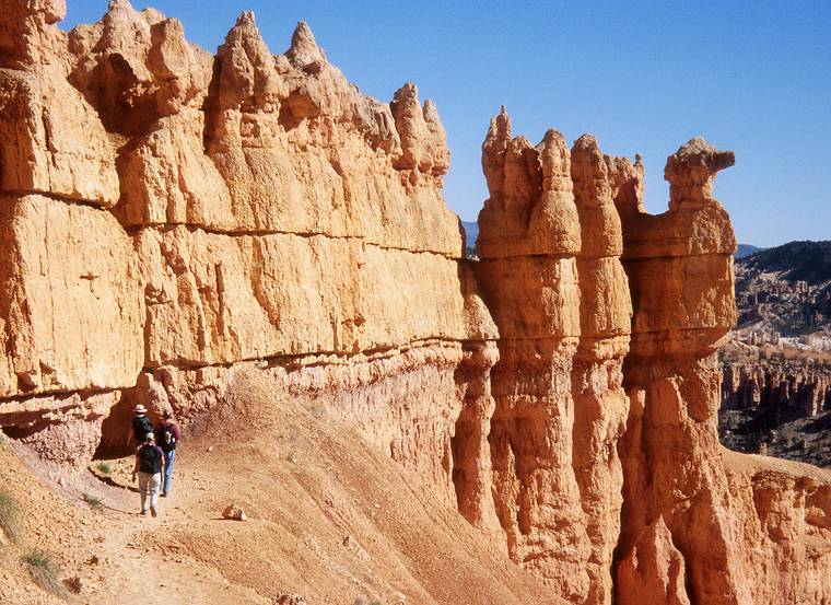 May 23, 2001 - Peekaboo Loop Trail Hike, Bryce Canyon National Park, Utah.<br />Joyce, Baiba, and Ronnie about to enter a tunnel in a row of hoodoos,<br />among them the "duck".